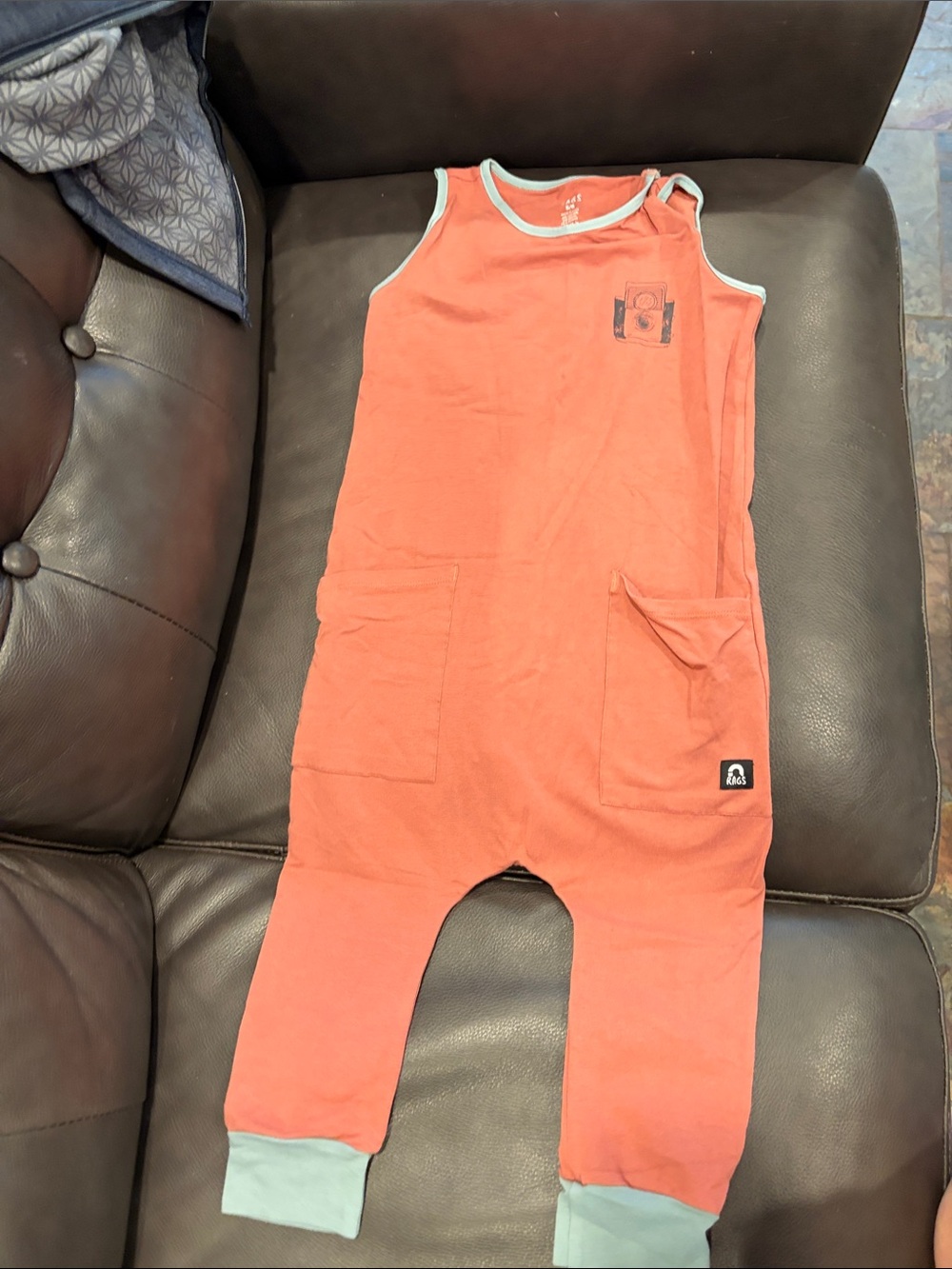 Rags to Raches Red Romper with Mint Trim camera romper